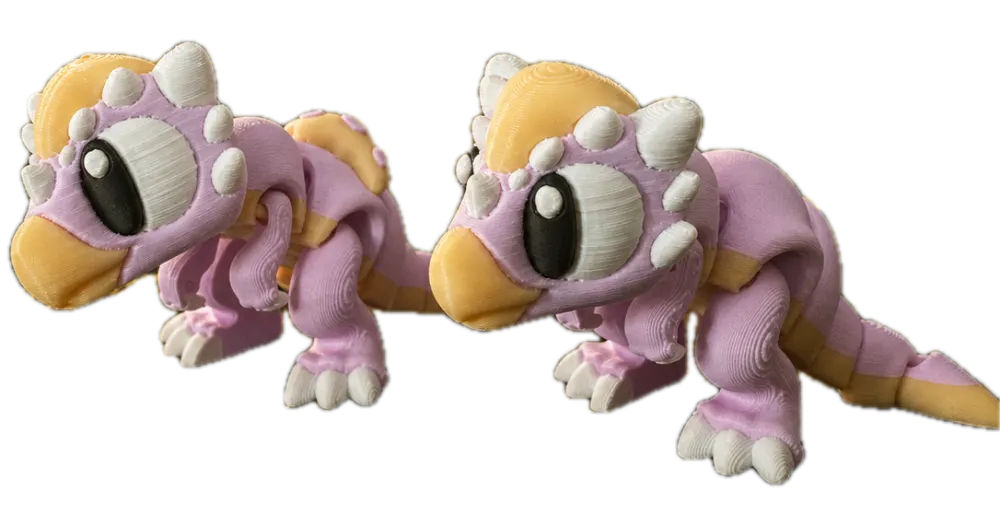 Stygimoloch duo: twee paarse 3D-geprinte dino's met hoorns en grote ogen